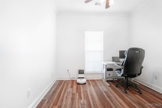 office area featuring crown molding, ceiling fan, and light hardwood / wood-style flooring