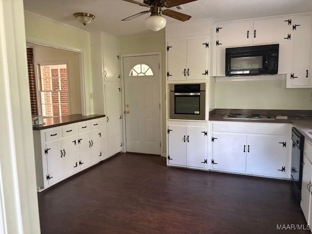 kitchen with electric cooktop, dark hardwood / wood-style flooring, ceiling fan, oven, and white cabinets