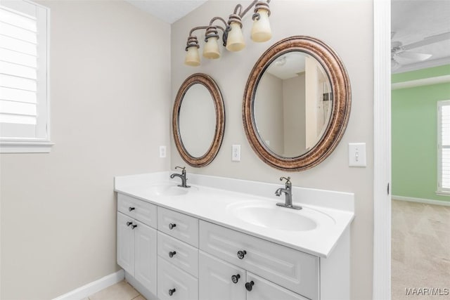 bathroom featuring ceiling fan and vanity