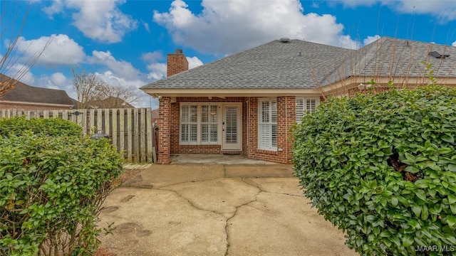 back of house with a patio area