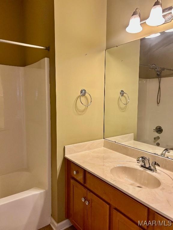 bathroom with vanity and shower / bath combination