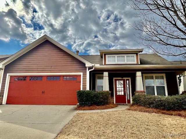 view of front of property featuring a garage