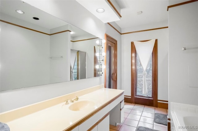 bathroom featuring vanity, independent shower and bath, and tile patterned flooring