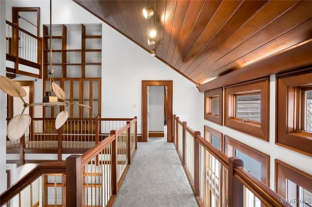 120 Willow Ln, Wetumpka, AL 36092 - corridor featuring lofted ceiling, light colored carpet, an upstairs landing, and wooden ceiling