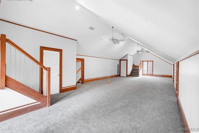 bonus room with lofted ceiling, carpet floors, and ceiling fan