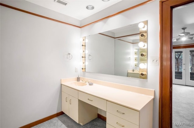 bathroom with vanity, ceiling fan, and french doors