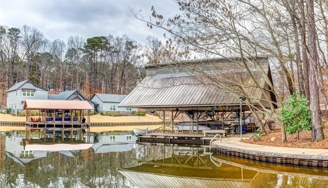 dock area with a water view