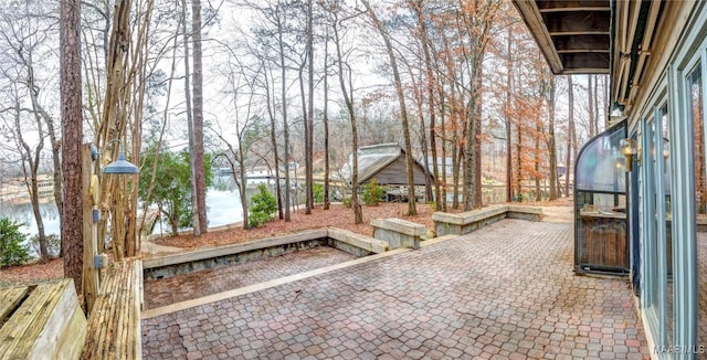 view of patio / terrace featuring a water view