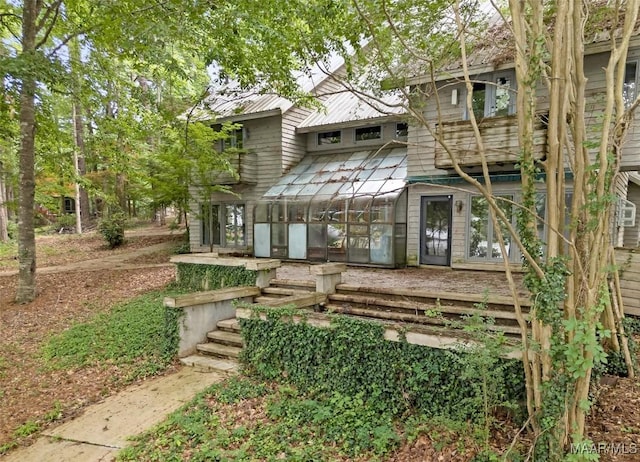120 Willow Ln, Wetumpka, AL 36092 - back of property with a sunroom and metal roof