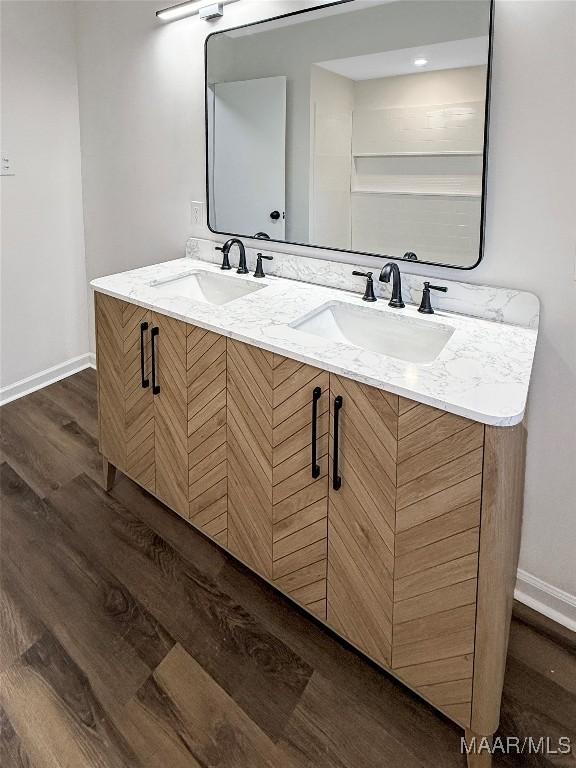 bathroom featuring vanity and hardwood / wood-style floors