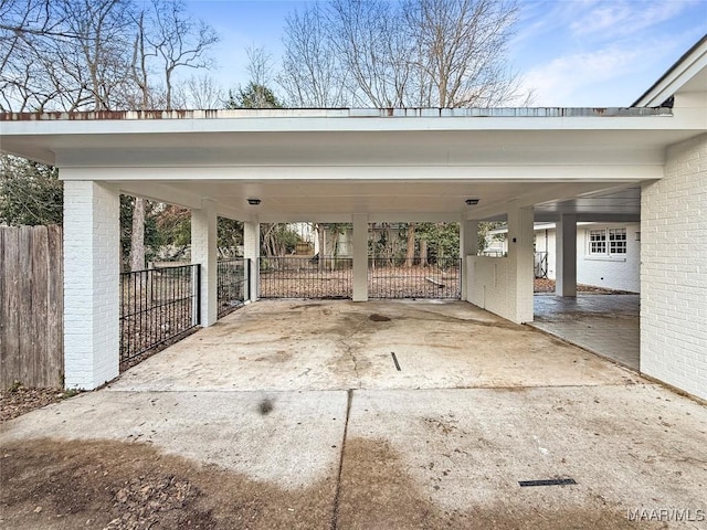 view of parking / parking lot featuring a carport