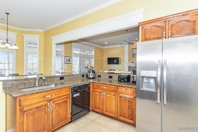 kitchen with dishwasher, sink, stainless steel fridge, light stone counters, and kitchen peninsula