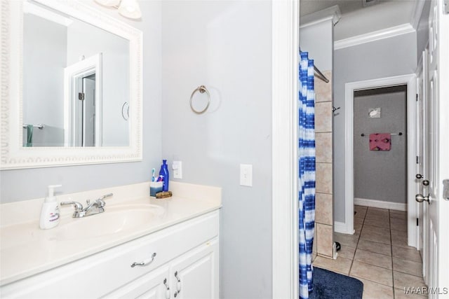 bathroom with vanity, tile patterned floors, crown molding, and a shower with curtain