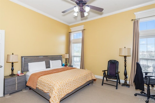 bedroom with crown molding, carpet, and ceiling fan