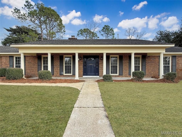 single story home featuring a front yard