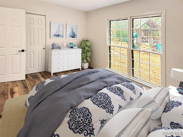 bedroom featuring wood finished floors
