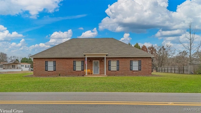 view of front facade featuring a front yard