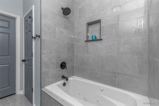full bath with tile patterned floors and a combined bath / shower with jetted tub