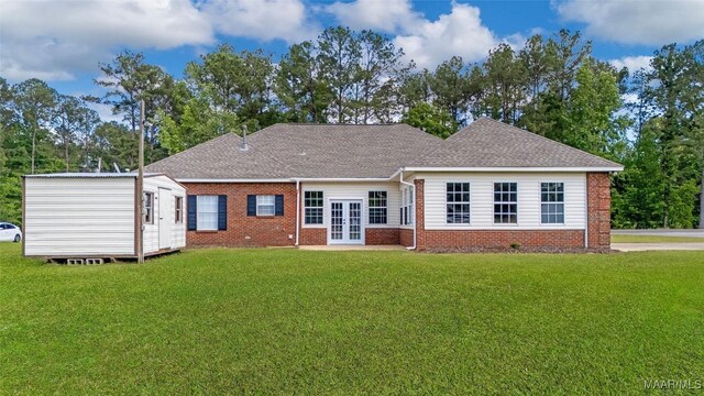 541 Baltzer Rd, Wetumpka, AL 36092 - rear view of property featuring french doors, a lawn, brick siding, and a shingled roof