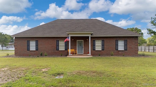 541 Baltzer Rd, Wetumpka, AL 36092 - view of front facade with a shingled roof and brick siding