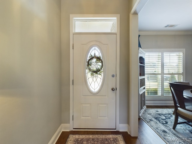 entrance foyer featuring a healthy amount of sunlight and dark hardwood / wood-style flooring