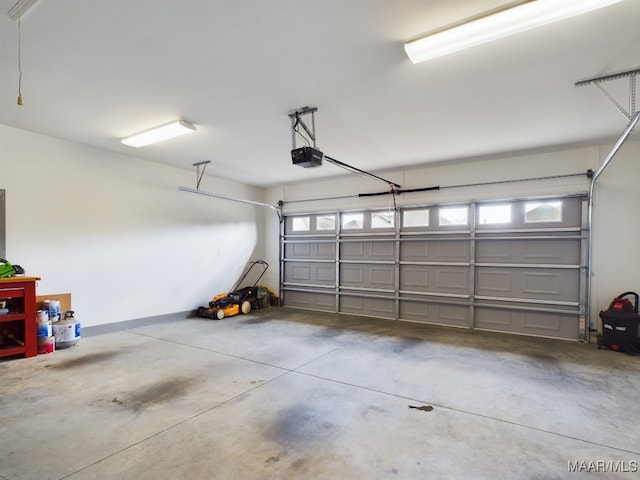 garage featuring a garage door opener