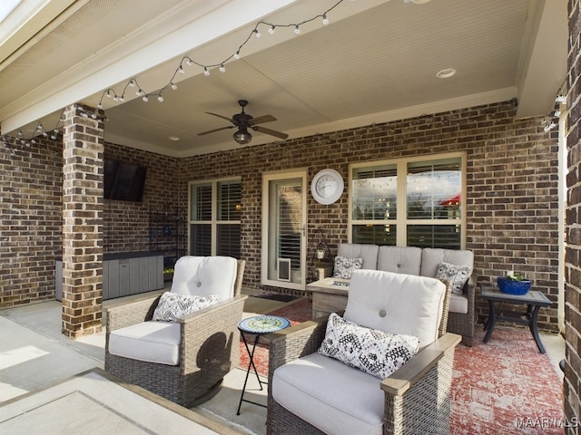 view of patio with an outdoor hangout area and ceiling fan