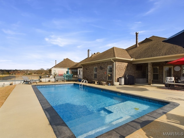 view of pool with a patio