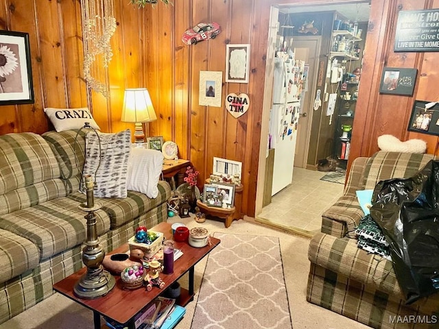 living room with wood walls