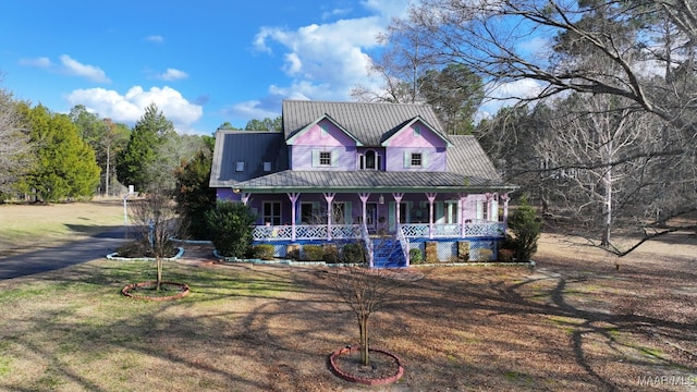 farmhouse-style home with covered porch