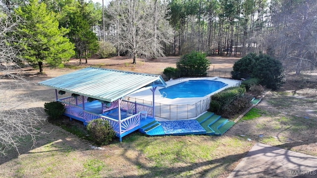 view of pool with a water slide