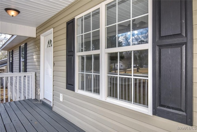 wooden deck featuring covered porch