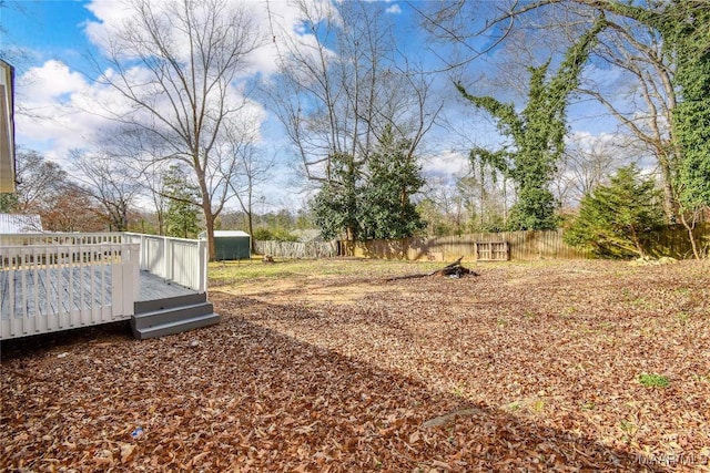 view of yard featuring a deck