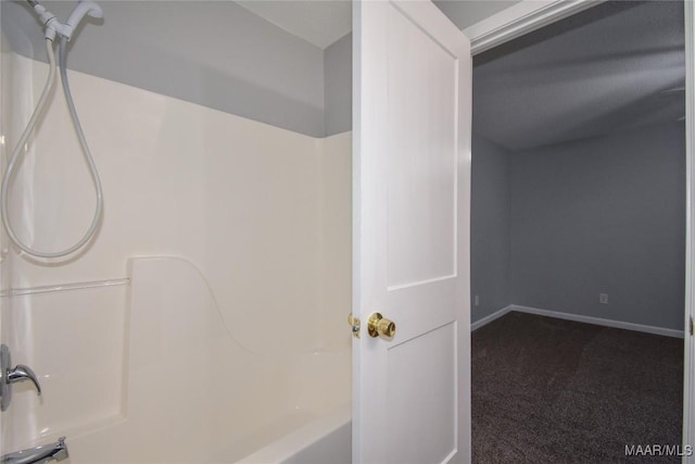 bathroom featuring  shower combination