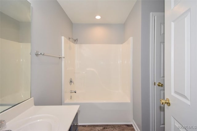 bathroom featuring vanity and bathing tub / shower combination