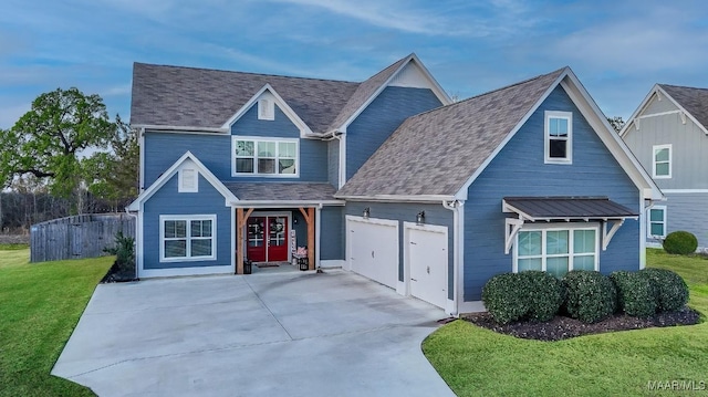 view of front facade featuring a garage and a front yard