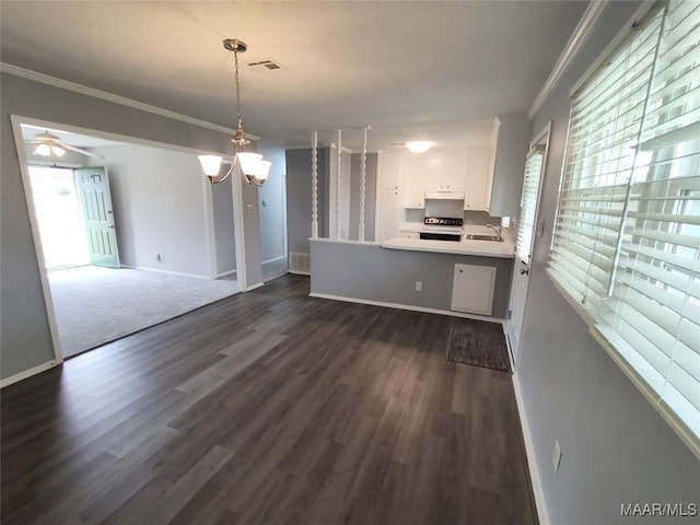 interior space featuring dark hardwood / wood-style flooring, sink, crown molding, and ceiling fan with notable chandelier