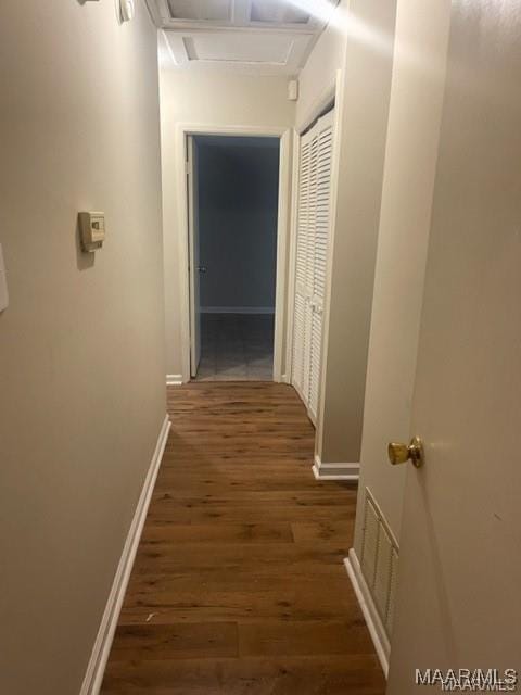 hallway featuring dark wood-type flooring