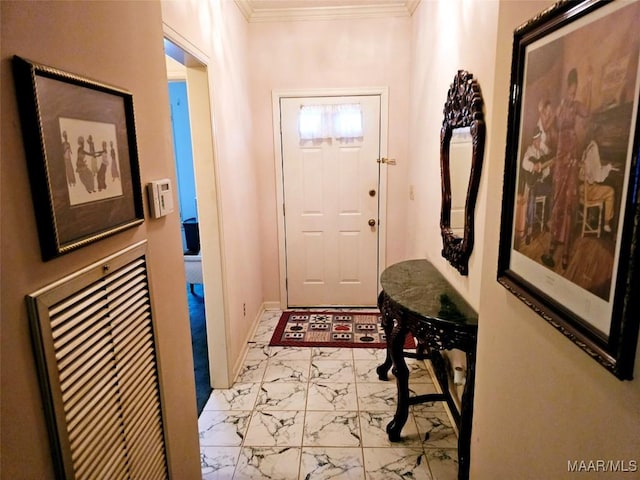 entryway featuring ornamental molding