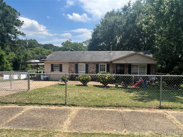 single story home with a front yard