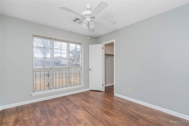 interior space featuring dark hardwood / wood-style floors and ceiling fan