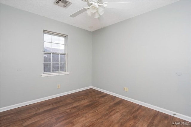 unfurnished room with hardwood / wood-style flooring and ceiling fan