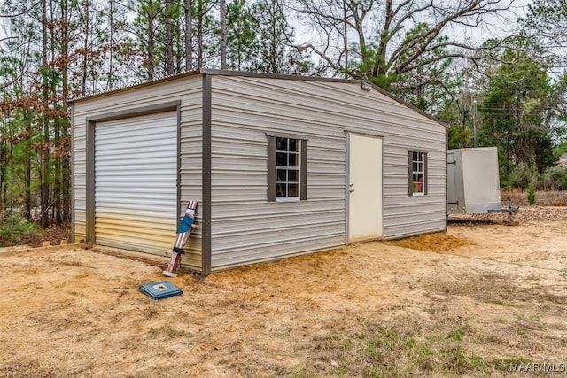 view of outbuilding featuring a garage