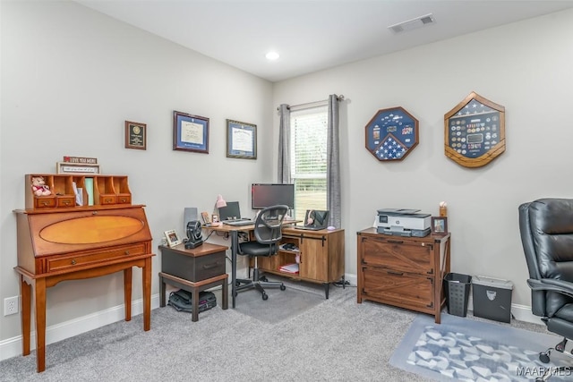 office area featuring light colored carpet