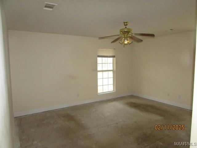 spare room featuring ceiling fan