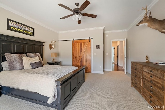 carpeted bedroom featuring crown molding, a barn door, and ceiling fan