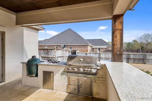 view of patio with a grill and area for grilling