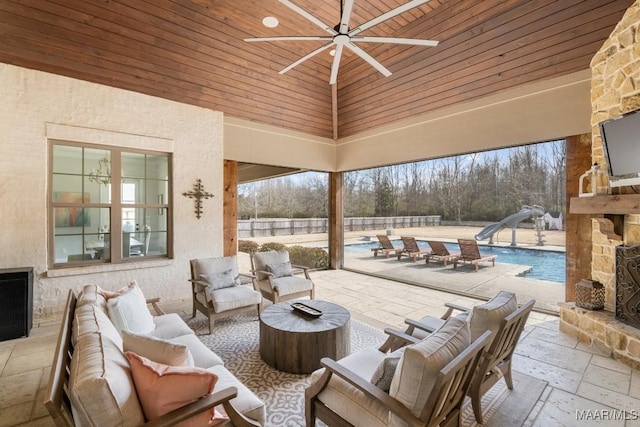 view of patio / terrace with ceiling fan and an outdoor hangout area