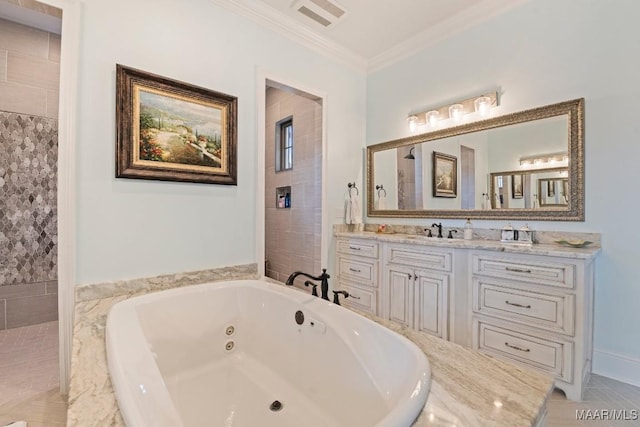 bathroom with ornamental molding, vanity, and a tub to relax in