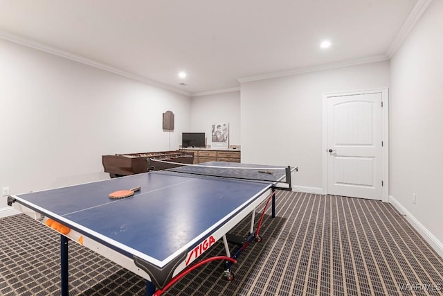 rec room with dark colored carpet and crown molding